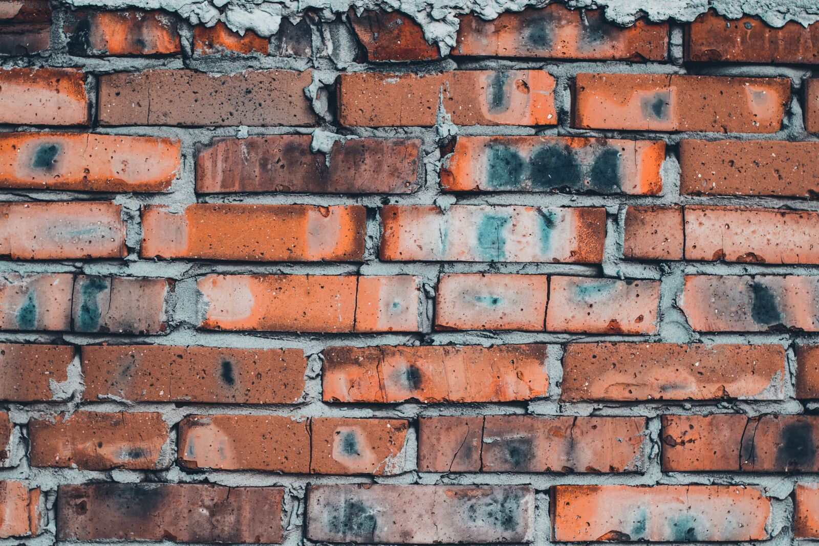 Weathered red brick wall texture