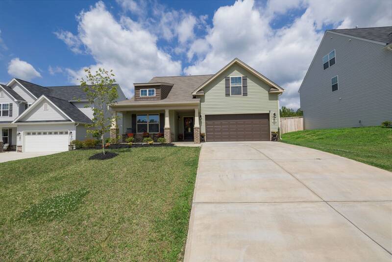 A suburban single family home with a wide driveway, typical of Cherry Hill neighborhoods