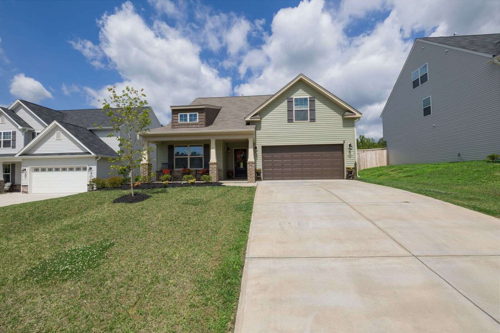 A suburban single family home with a wide driveway, typical of Cherry Hill neighborhoods