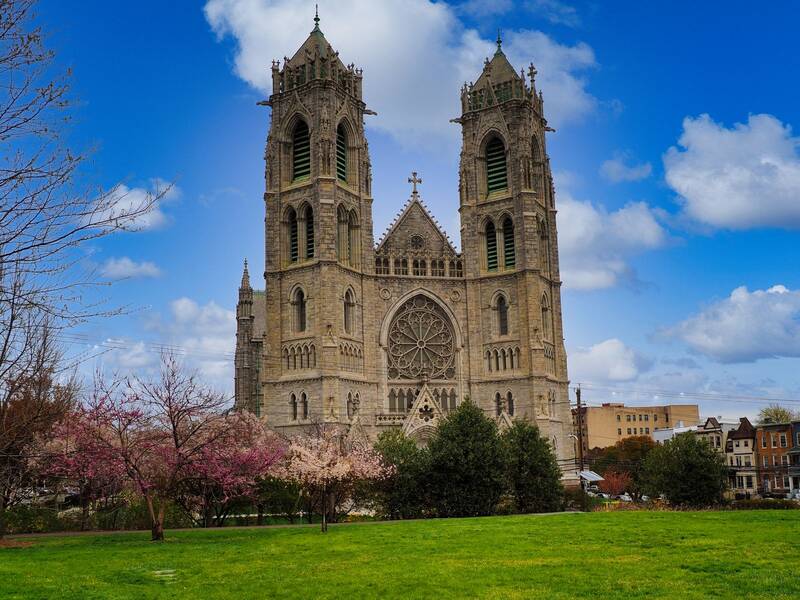 The Cathedral Basilica of the Sacred Heart in Newark surrounded by spring blossoms