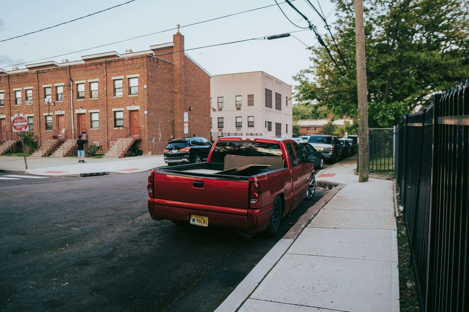Brick rowhouses on a quiet residential block, a familiar streetscape in Newark's Ironbound