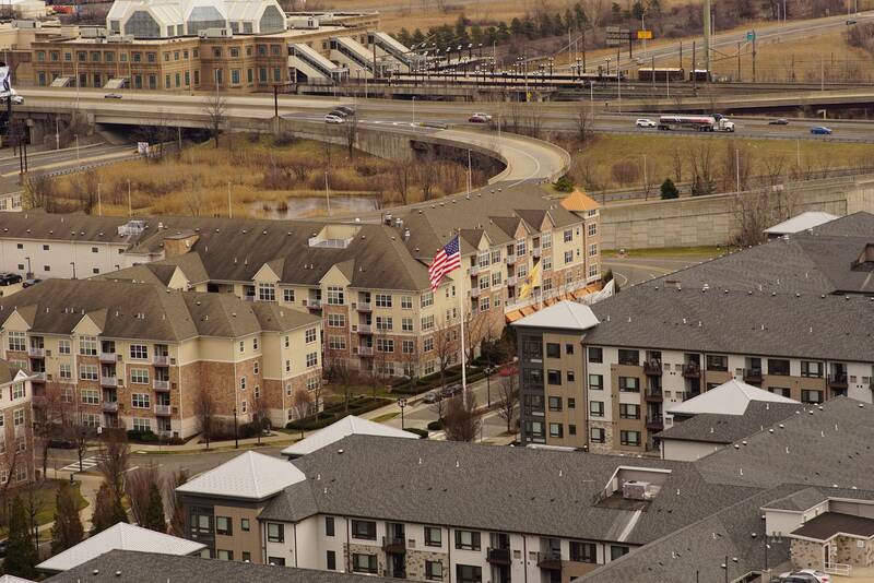 Apartment blocks beside the highway in an urban New Jersey neighborhood