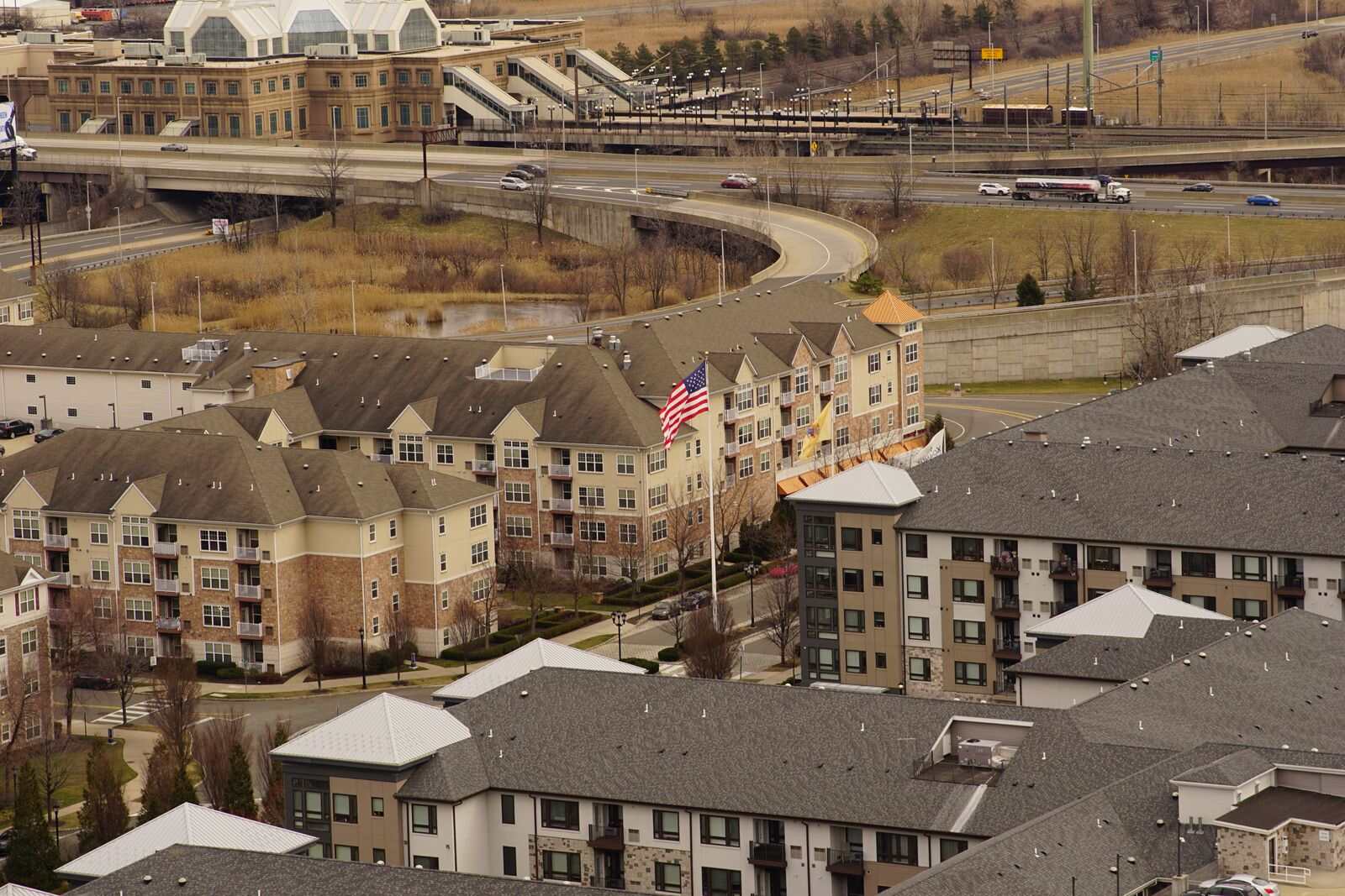 Apartment blocks beside the highway in an urban New Jersey neighborhood